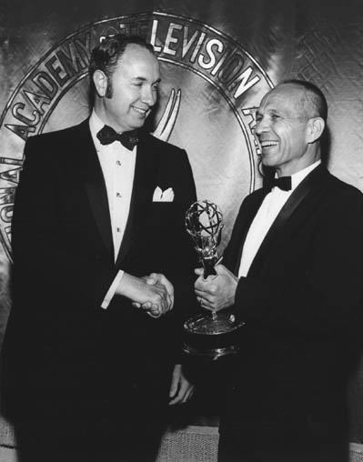 For the work done in this area, NASA received an Emmy Award from the National Academy of Television Arts and Sciences. Shown here is Faget accepting the award on behalf of NASA on June 29, 1970.